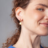 Deine Ohrringe schmerzen? So verhinderst du Druck und Ausleiern