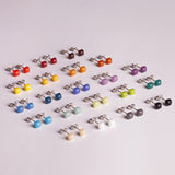 Foto von Small geometric earrings • 4mm