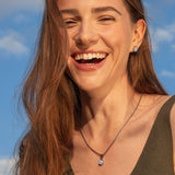 Foto von Stainless steel stud earrings with stone • Mother-of-pearl look • 8mm